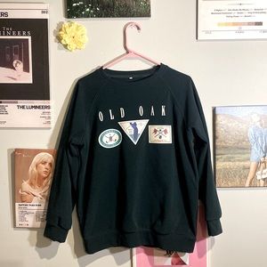 Dark green thick oversized crew neck w/ cuffed sleeves a velvet feel. :)